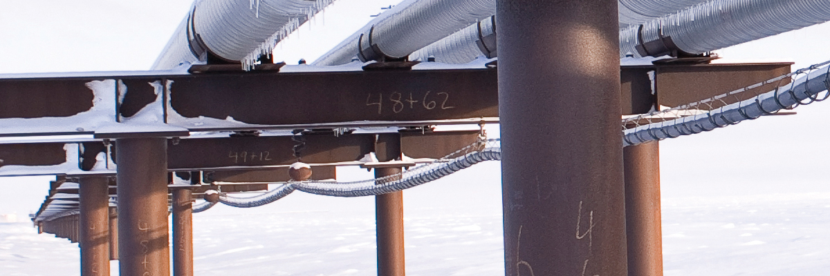 CAB Cable Rings and Saddles photographed under Oil Pipeline