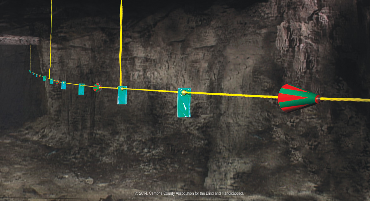 CAB Rope Lifeline with directional cones and reflective markers in coal mine
